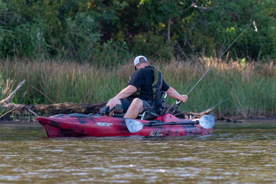 <b> Do you stand or sit when fishing from your kayak?</b></p>

<p>If youâre going to be pitching, it really helps to stand up. Thatâs really the only time I do something like that. At first, when I first started with the kayak, I felt like I was at a huge disadvantage because I couldnât see the fish or I couldnât see as well as I can from the bass boat. But then I began to realize thatâs not a disadvantage but an advantage because the fish canât see me, either. They can see you when youâre standing up high; when youâre low to the water they donât see you. So now I may not see a fish laying on the bed, but it doesnât matter: Iâm going to catch him anyway.