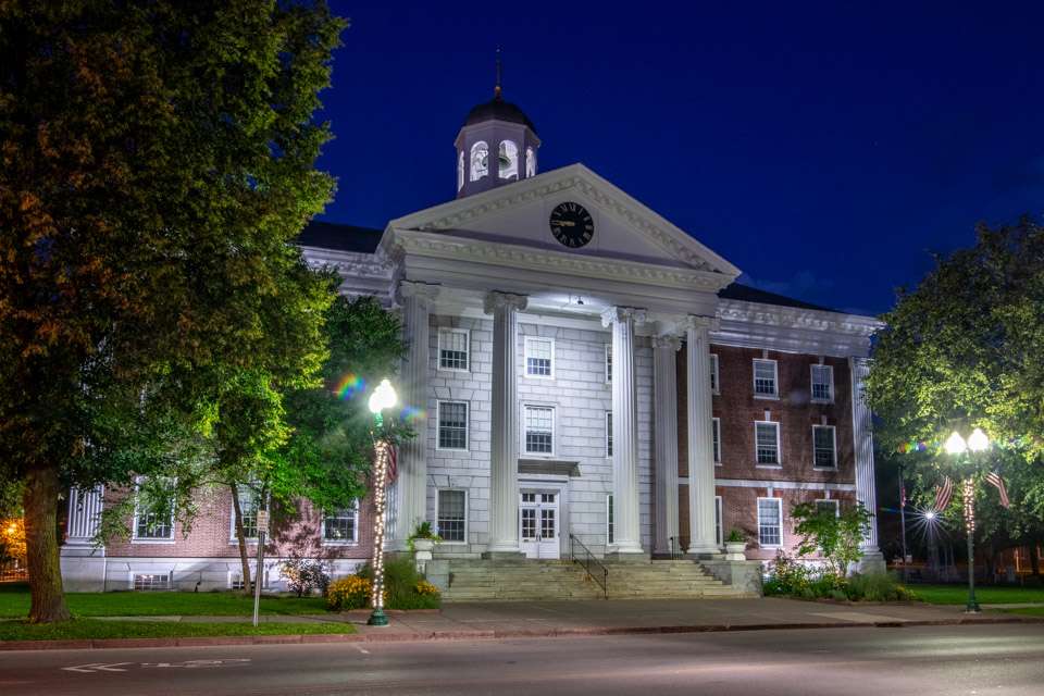 Auburnâs Memorial City Hall was built in the 1930s and is beautifully lighted at night.