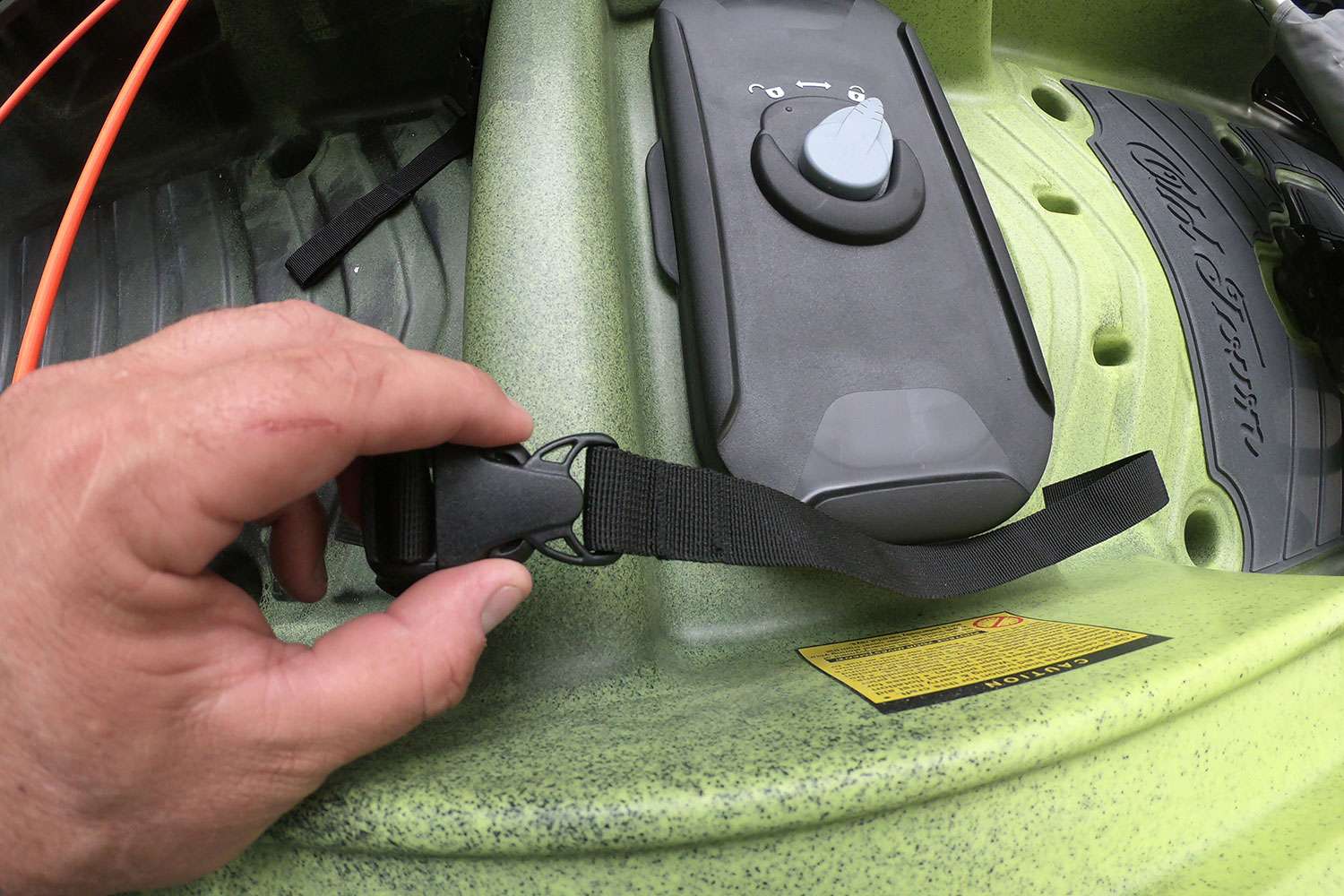 These straps are meant to secure the seat to the deck of the kayak. 