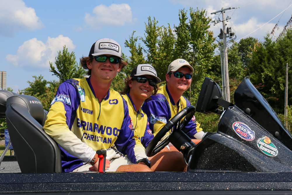 Also waiting w in line are the Day 2 leaders Grayson Morris, Tucker Smith and their boat captain JT Russell. 