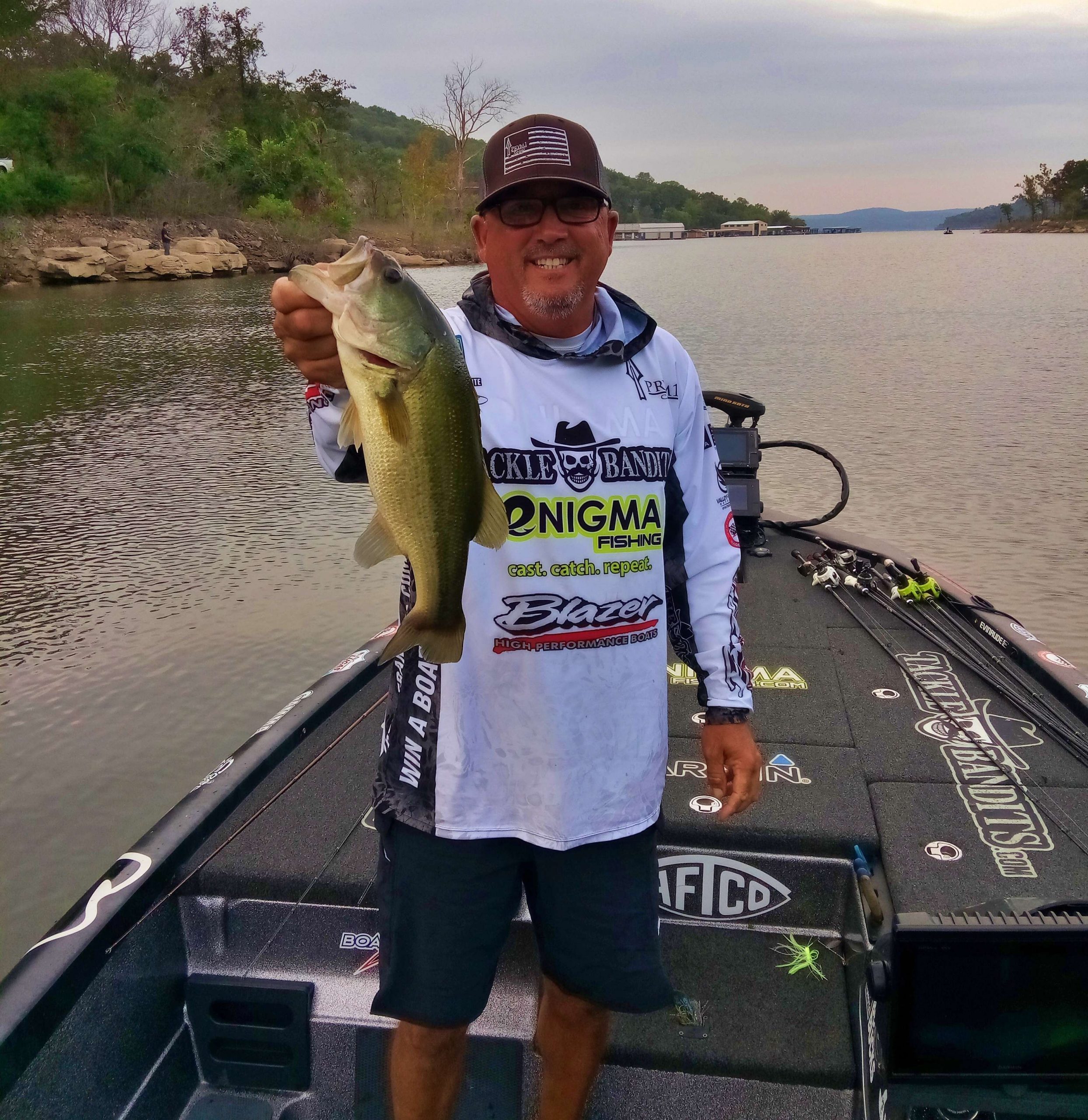 Jesse Tacoronte with a Tenkiller largemouth.