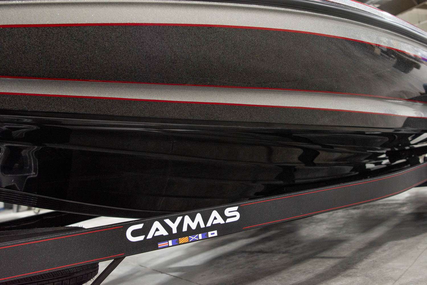 The Caymas trailer comes standard with a swing-tongue, custom aluminum wheels, lighted step pads and LED lights.
