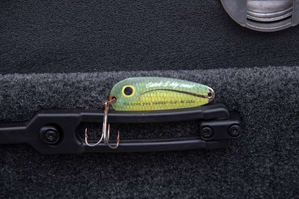 Small reminders of family, like this customized lure from his children, can be found tucked around Carriereâs Skeeter.