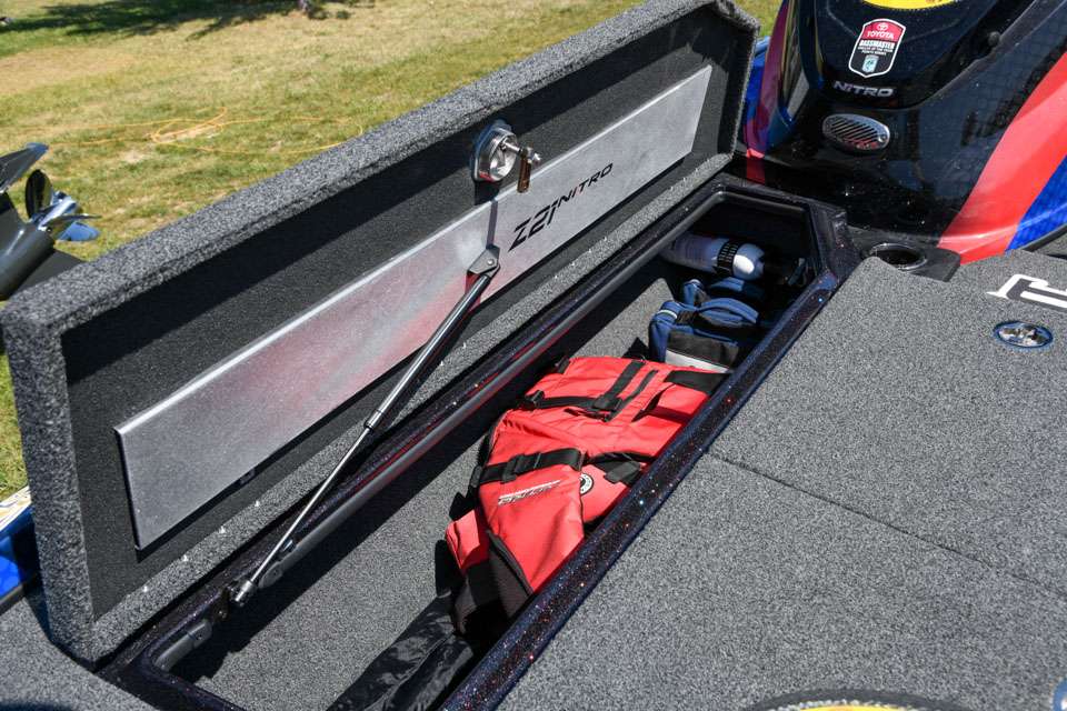 His starboard rod locker is used to carry life jackets and miscellaneous gear. âI usually use it for storage and some spinning rods,â he said. âItâs a catch-all. Thatâs where your fire extinguisher is, and I usually store my spinnerbaits there.