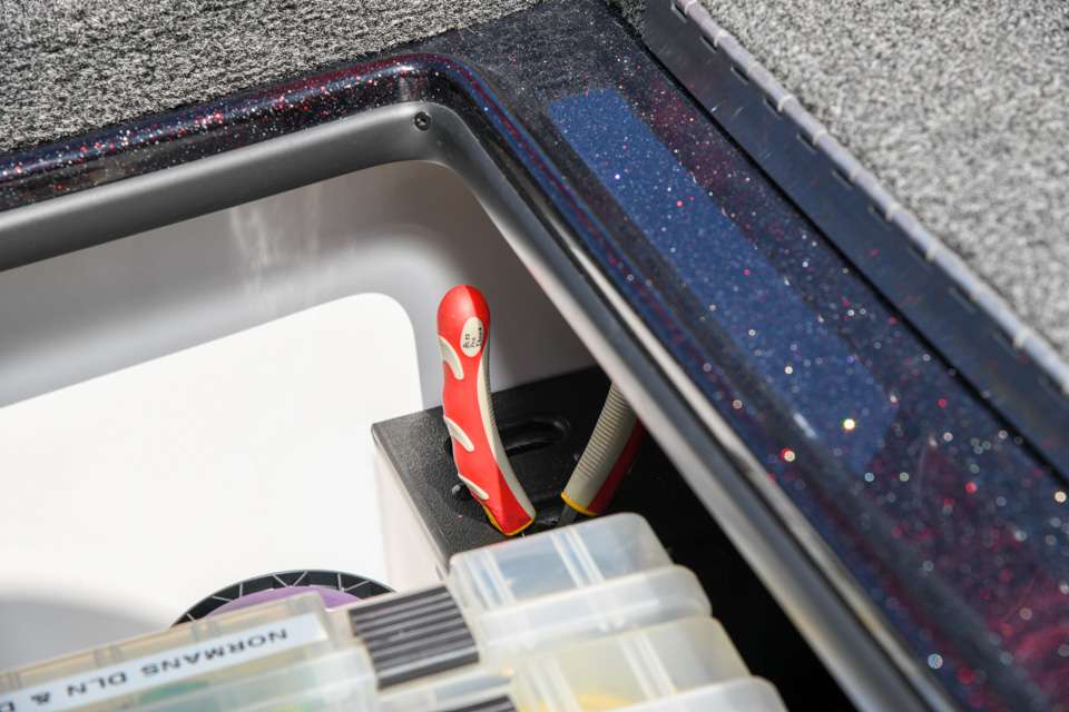 This compartment also has holders for wire cutters and split-ring pliers. âThose are things I donât need much, so I keep them stored in here,â he said. âThe stuff I do use a lot, like my scissors and my needle nose pliers, I always set out. 