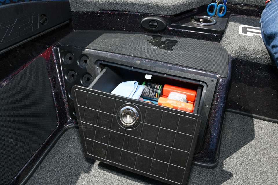 Hidden in the rear of the front deck, just in front of the passenger seat, is a drawer that serves to hold all kinds of extra gear. 