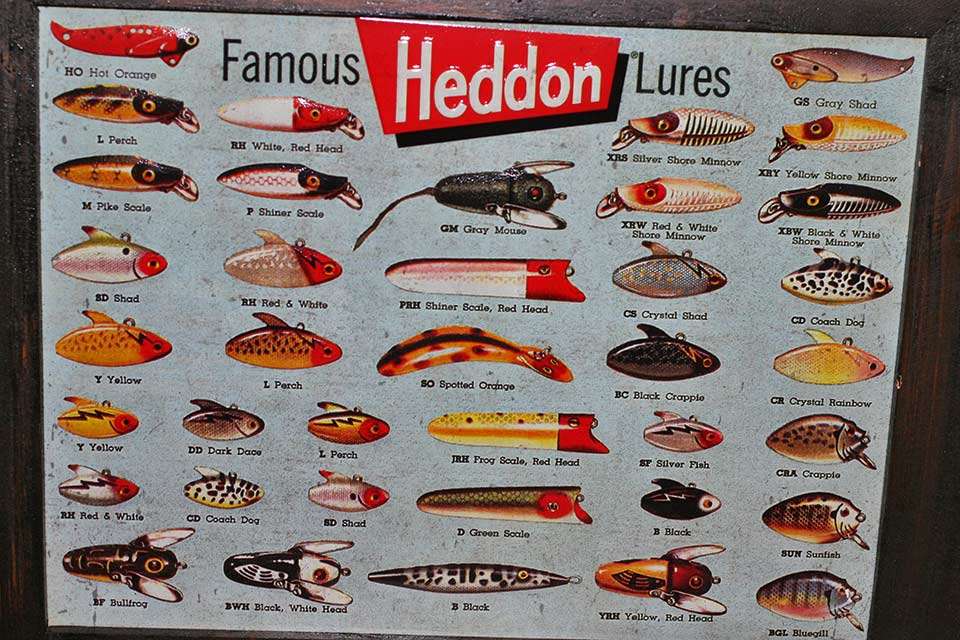 Heâs collected some other cool items along the way, like this Heddon sign.