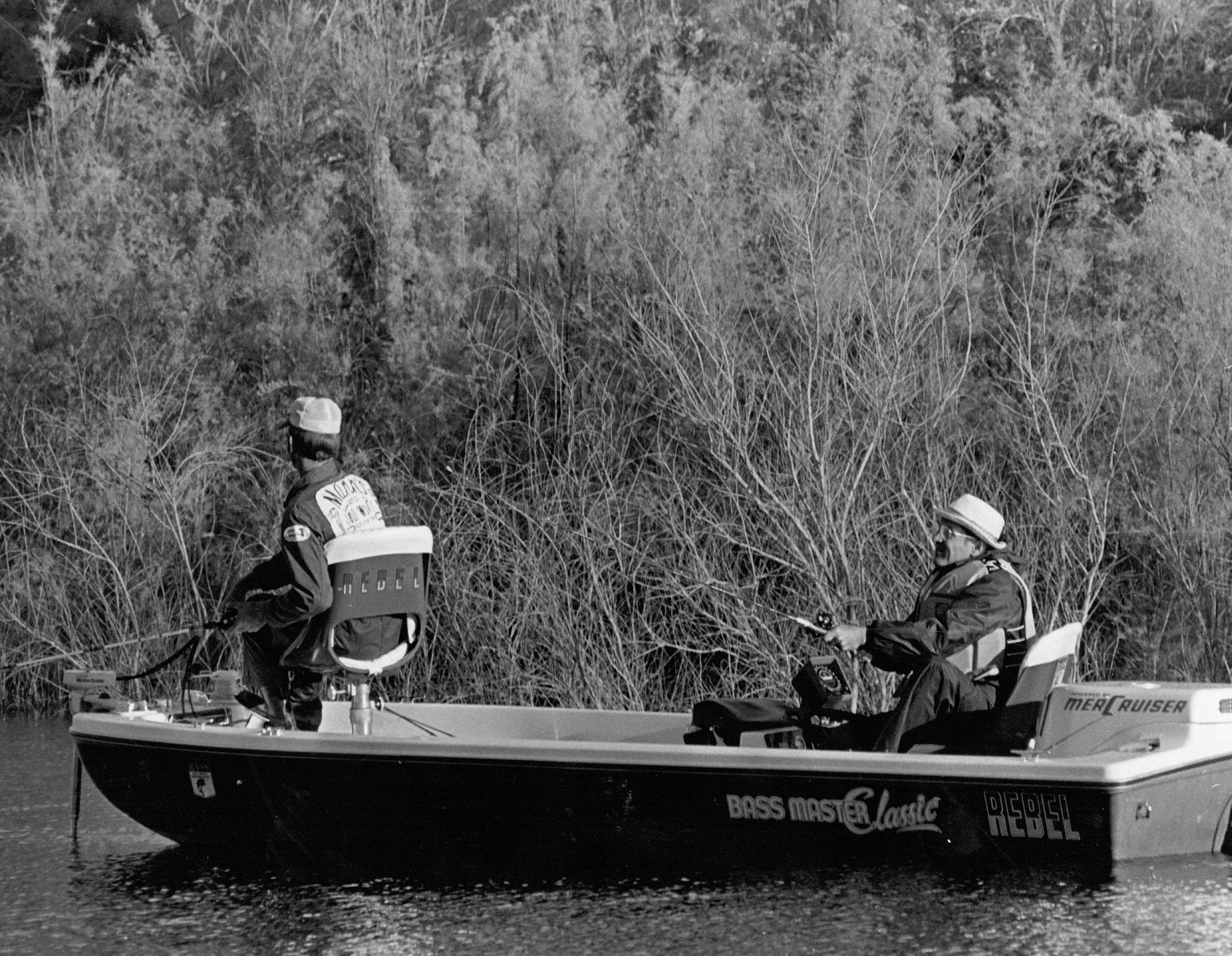 It's difficult to tell if that is Tom Mann fishing at the front of this boat, but the angler is indeed wearing the logo of the company Mann founded. Mann flipped a 4-inch Mann's Jelly Worm to his second-place finish, according to Bassmaster Magazine.