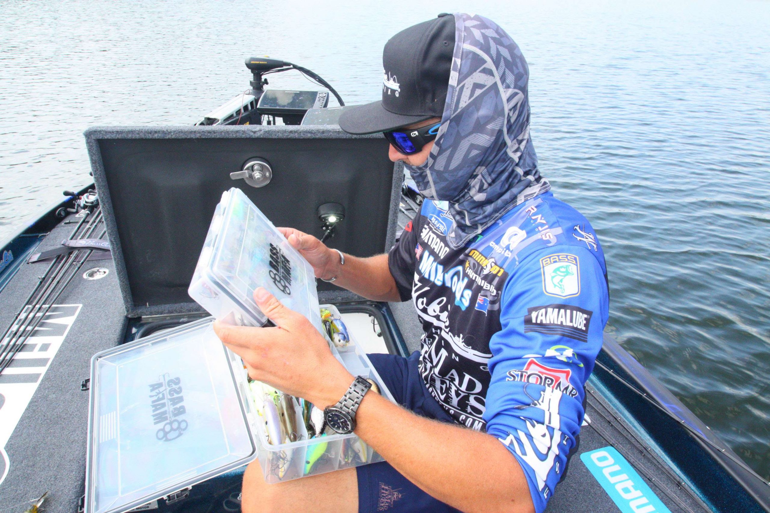 <b>11:02 a.m.</b> Jocumsen decides to shift gears and fish a nearby main-lake point. The structure is shallow on top, studded with stumps and drops off into 16 feet on either side. He pulls out several crankbait boxes and selects a crawfish colored Molix Sculpo deep-diver. âI caught lots of fish on this bait at the 2016 Bull Shoals [Arkansas] Elite tournament, so Iâve got confidence in it.â He casts the plug to the end of the point and dredges up a wad of grass. <br>
<b>11:06 a.m.</b> Jocumsen switches to a shad pattern Strike King 6XD crankbait and grinds it off the side of the point. <br>
<b>11:09 a.m.</b> He replaces the 6XD with a perch-colored Molix F Crank DR. âIâm seeing some suspended fish on my electronics, but so far I havenât found the right trigger for them.â <br>
<b>11:11 a.m.</b> A bass bumps the F Crank but doesnât hook up. Jocumsen immediately casts the swimbait with the belly spinner to the same spot. No takers. <br>
<b>11:14 a.m.</b> Jocumsen opts to try a finesse worm off the point. He rigs a Roboworm in the margarita mutilator color on a No. 1 drop-shot hook, attaches a 12-inch drop line with a 3/8-ounce sinker below the lure, then drags it across rocks on the bottom. He immediately detects a bite, tightens down on the fish and swings a nonkeeper aboard. âIâm seeing several fish on my electronics, and they donât all look this small.â <br>
<b>11:17 a.m.</b> A good fish picks up the Roboworm. Jocumsen sticks it momentarily, but it comes unbuttoned. âThat one felt solid.â Whatâs his take on the day so far? âThe early pad bite looked promising, but it died off quickly and Iâve been struggling ever since. There are some big fish in this lake, and Iâm hoping I can get something going. Iâll fish out this point, hit a couple other deep structures, make a quick pass through some more pads, then hit the dam once more in my remaining time.â <br>
<b>11:20 a.m.</b> Jocumsen catches a microbass on the Roboworm. <br>
<b>11:21 a.m.</b> Another tiny bass eats the Roboworm. âIâm still seeing some big fish down there on my electronics.â <br>
<b>11:24 a.m.</b> Jocumsen casts the spinnerbait to the same spot and slow rolls it through the water column. As it nears the boat, he marks a big fish moving up from deep water toward the bait on his graph, but it doesnât strike. <br>
<b>11:27 a.m.</b> Having followed the point toward shore, Jocumsen switches crankbaits to a shad colored Lucky Craft 2.5 squarebill and retrieves it parallel to the edge of the structure. <br>
<b>11:40 a.m.</b> Back to the Roboworm on the point. A bass strips the worm off the rig.
<p>
<b>2 HOURS LEFT</b><br>
<b>11:45 a.m.</b> The squarebill dredges up a wad of snot grass. <br>
<b>11:51 a.m.</b> Jocumsen makes a short hop back to the pads where he caught his two keepers and drags the rat across the cover. <br>
<b>11:59 a.m.</b> He moves to a point at the tributary entrance and tries the swim jig around submerged hydrilla.
