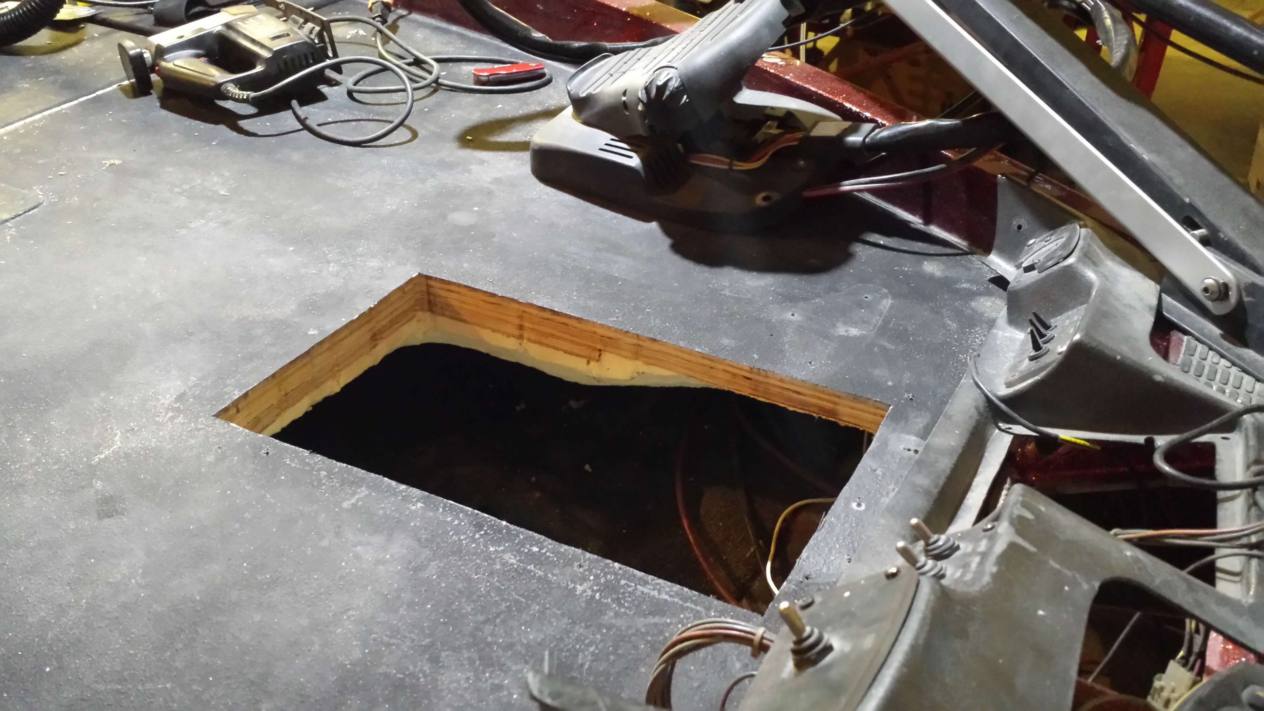 After cutting out the template, I closely examined inside the bow of the boat to make sure no debris was present that could clog the mechanical pumps. Upon finding a few pieces of foam, I used a shop vac to ensure everything was cleaned up.