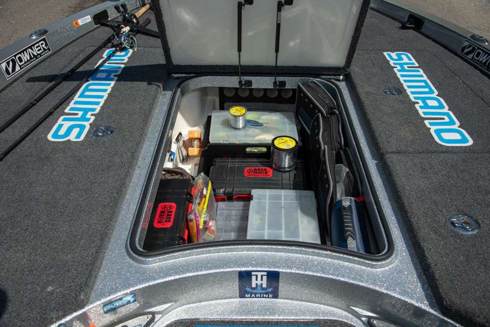 An amazing number of trays packed with lures, terminal tackle and line fill the large center compartment.