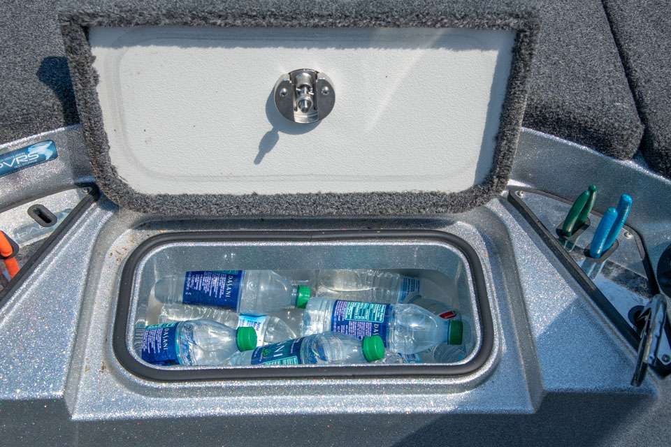 Beneath the lid of this compartment is a roomy ice chest in which Combs stores all the water he needs to remain hydrated during hot summer days.