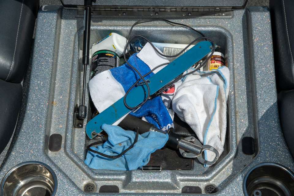 Beneath the step between the seats is a compartment in which Combs keeps his balance beam, towels and other miscellaneous items.