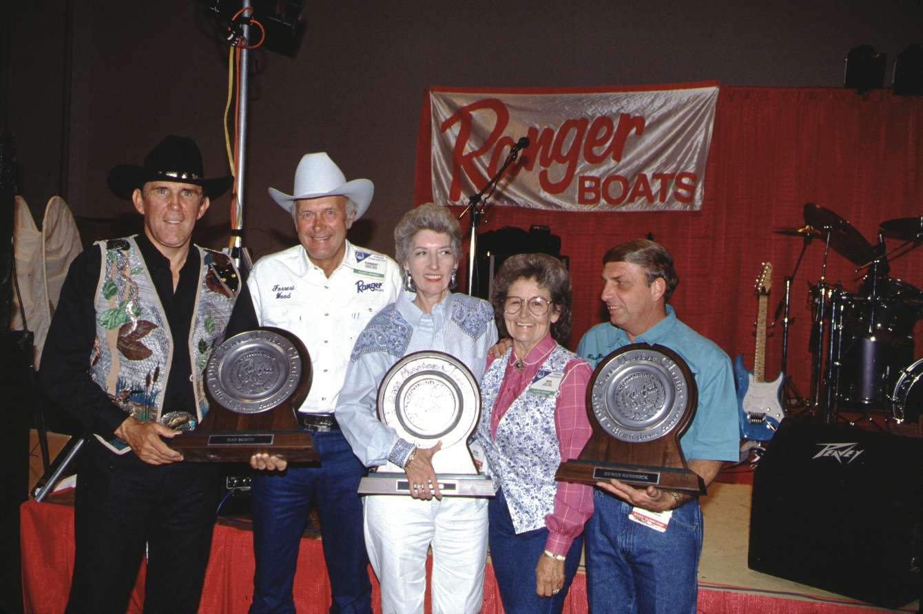 Over the years, special theme nights were a highlight of the Classic. One of the most anticipated of all was Ranger Night. Forrest and Nina took great pride and enjoyment from recognizing Ranger anglers and others for their achievements. Pictured are Ray Scott, Forrest, B.A.S.S. CEO and owner Helen Sevier, Nina and Dewey Kendrick, the tournament director for B.A.S.S. 