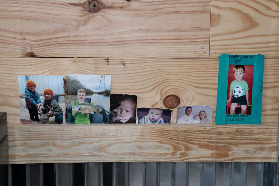 Photos of his children serve as reminders of important family time.
