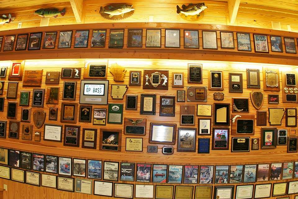 Wood has an entire wall filled with plaques from his days competing and supporting tournaments, as well as personal photos, ad magazine covers and trophy fish.