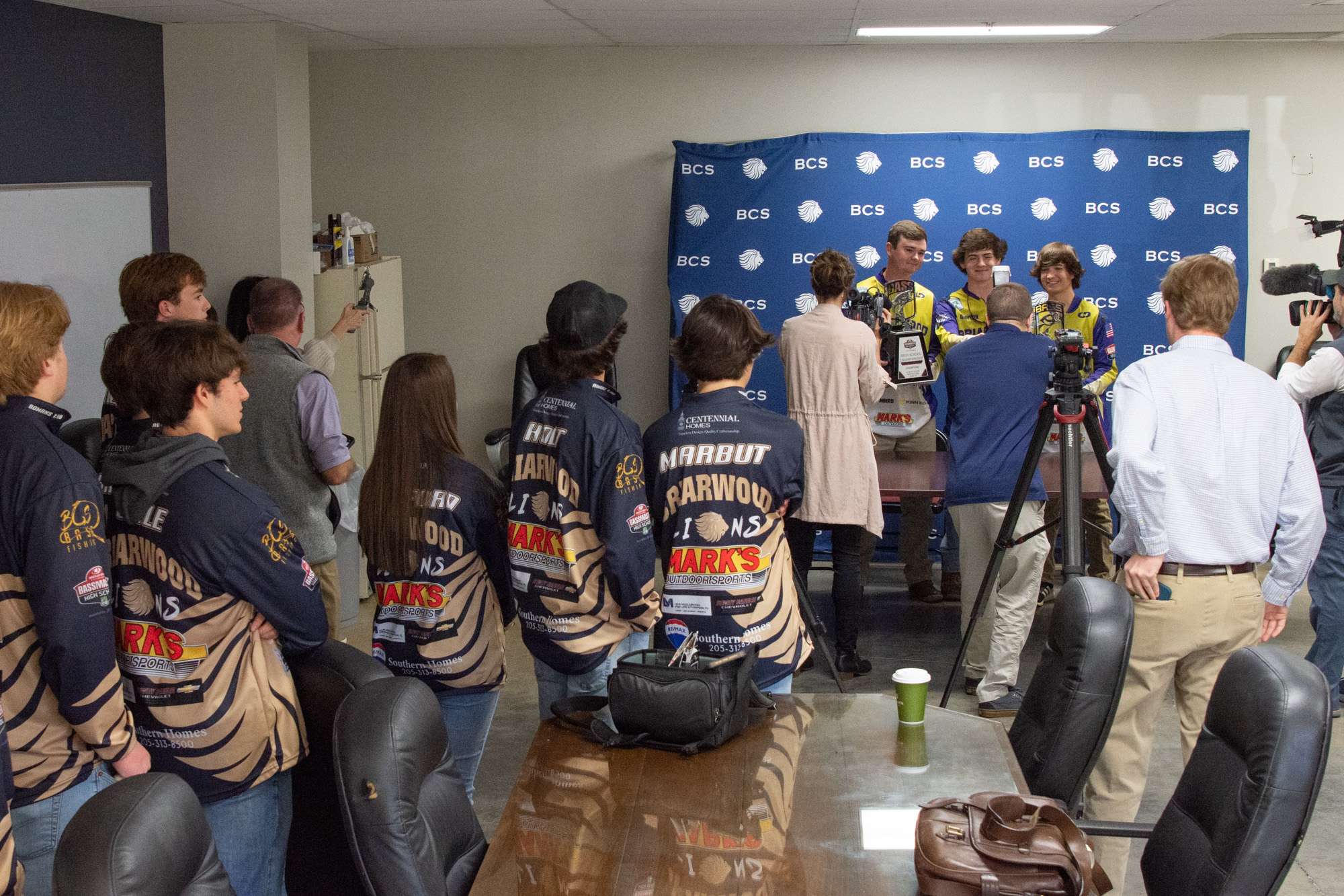 After the assembly, local media was on the scene to ask the team a few questions. 