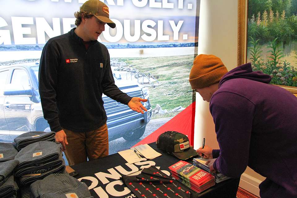 Luke Stoner of Dynamic Sponsorships helps get anglers signed up to earn the most money possible this week.