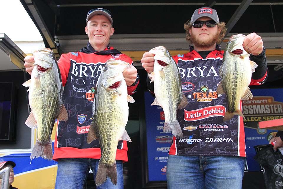 Thad Simerly and Ethan Shaw of Bryan College (4th, 48-15)