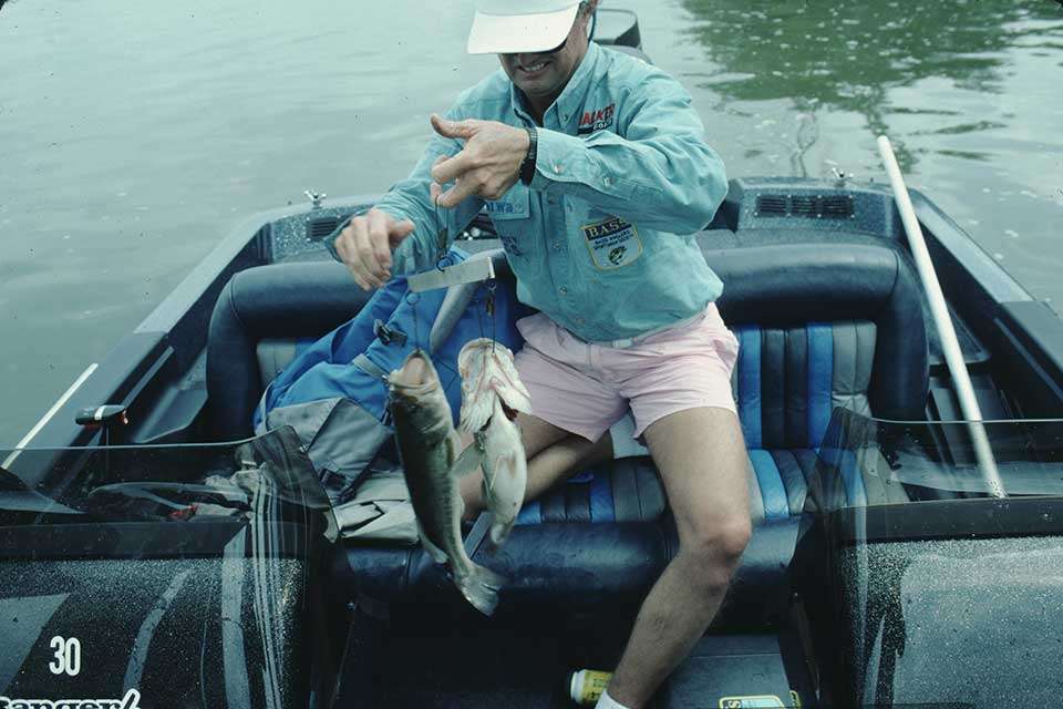 Clunn remains among the more colorful dressers in professional fishing. His blue oxford with patches goes well with pink shorts.