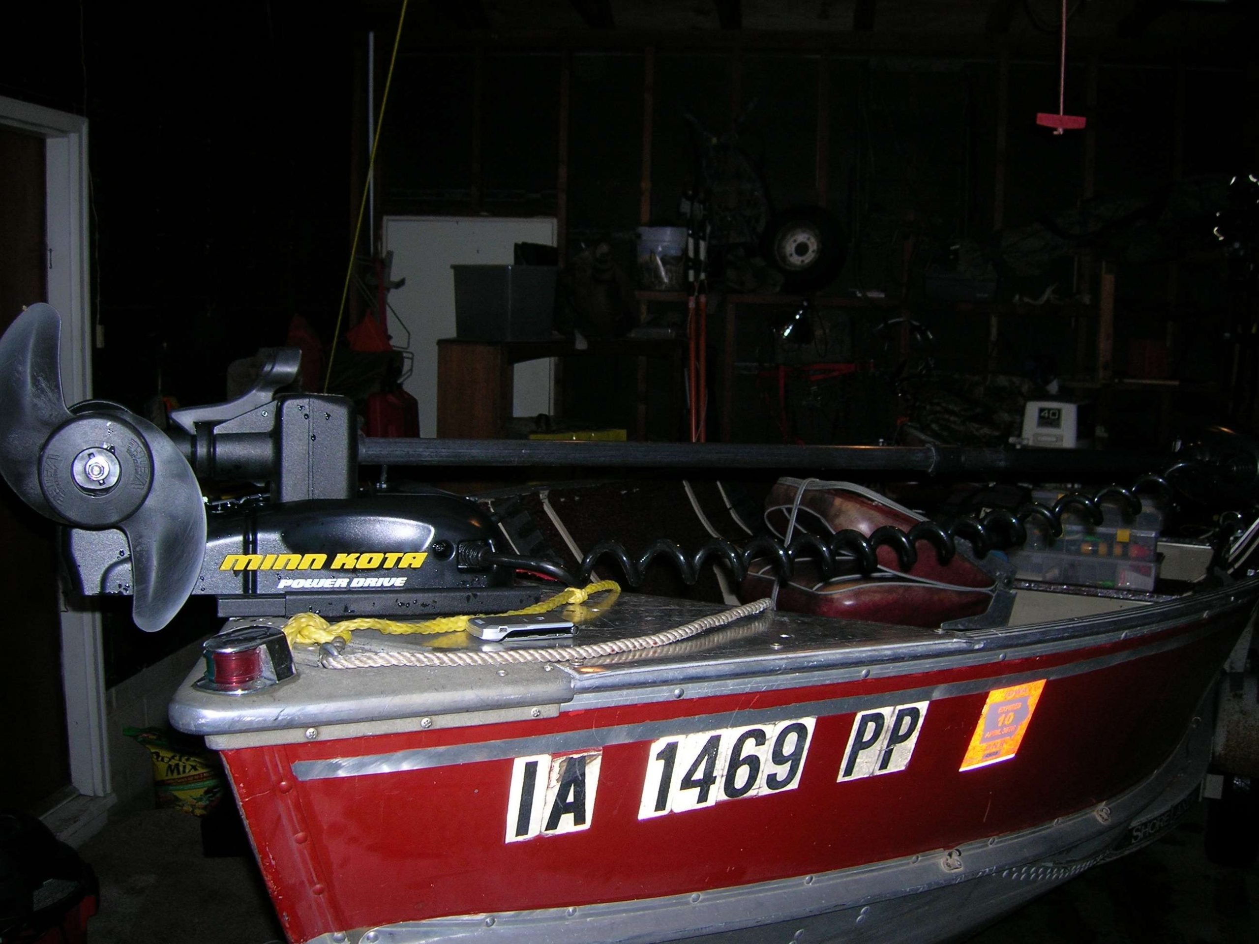 Here the trolling motor is mounted, and in front of that you can see my ultra-slick razor cellphone. 