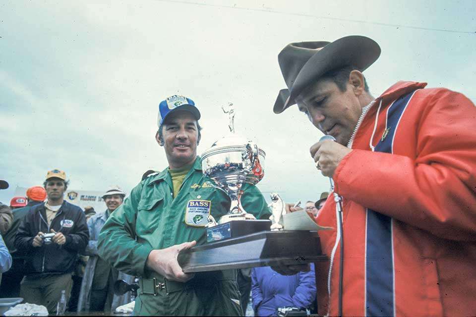 Don Butler, winner of the second Classic in 1972, poses with the trophy in his B.A.S.S. approved clothing.