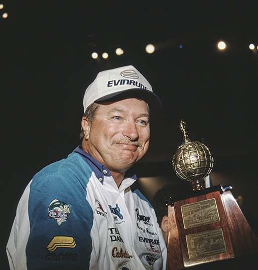 <b>1998</b><br>
After qualifying for the Classic 15 times and cracking the Top 10 twice, Denny Brauer finally puts it all together on High Rock Lake. He begins Day 1 by flipping his signature lure, a jig, but quickly downsizes to a 3-inch tube. The adjustment pays off with 29 pounds, 15 ounces, and his first Classic trophy.
