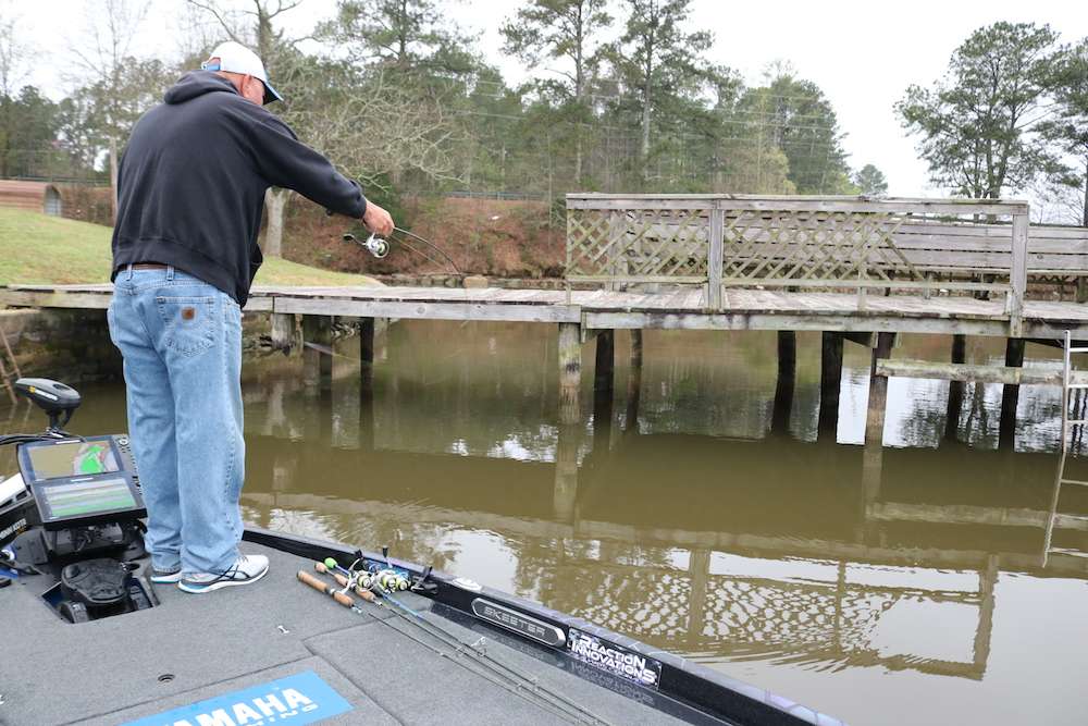 Their positioning under the docks requires a different approach. Using a small crappie jig, the angler must grab the lure, pull the rod tip down and use a sling-shot-type action to propel the bait into tight places.