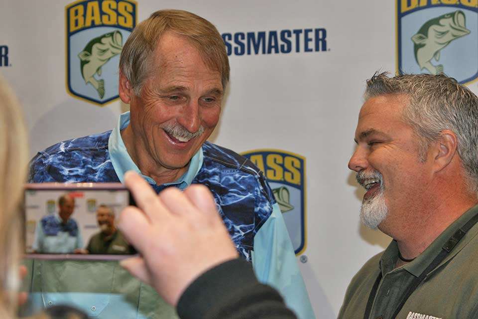 Two-time Classic champion Hank Parker and <em>Bassmaster</em> Magazine editor James Hall share a laugh during an interview in the B.A.S.S. booth.