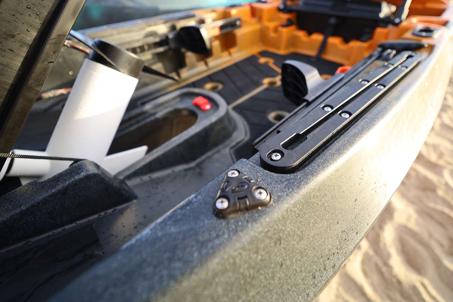 Accessory tracks are located on either side of the front, along with wire grommets to run cables for a fishfinder.
