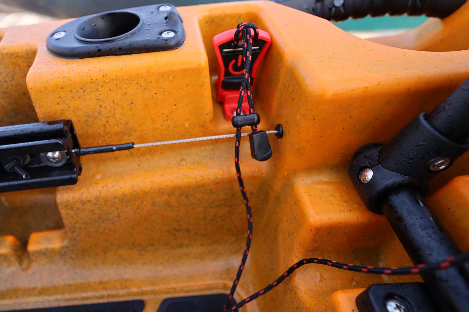 That clip magnetically attaches to the base knob, and when removes the power is cut to the trolling motor. 