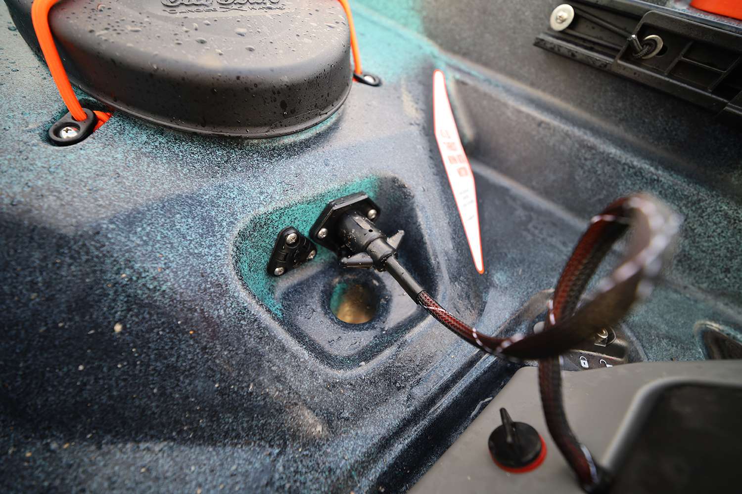 This is where the power supply is accessed, and the scupper hole is where wires from the fishfinder transducer are run.
