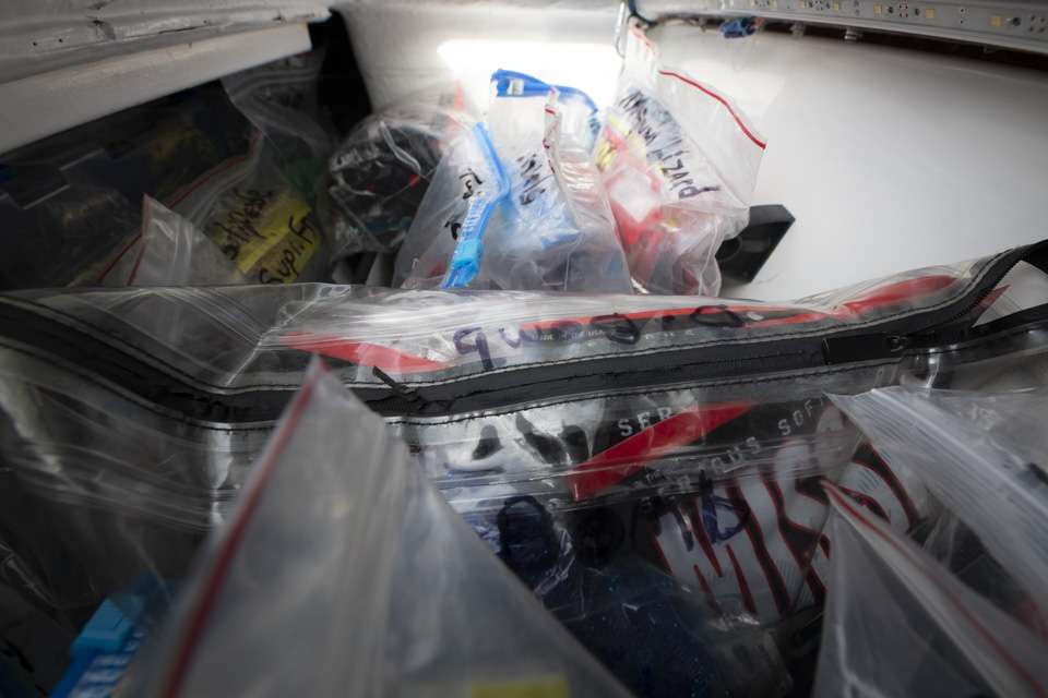 This compartment is massive, holding a number of zip bags packed with various plastic lures. It also is open on the left side, allowing him to store even more lures between this compartment and the largest storage compartment in the center of the deck. âI keep it packed with lures,â Latuso said.