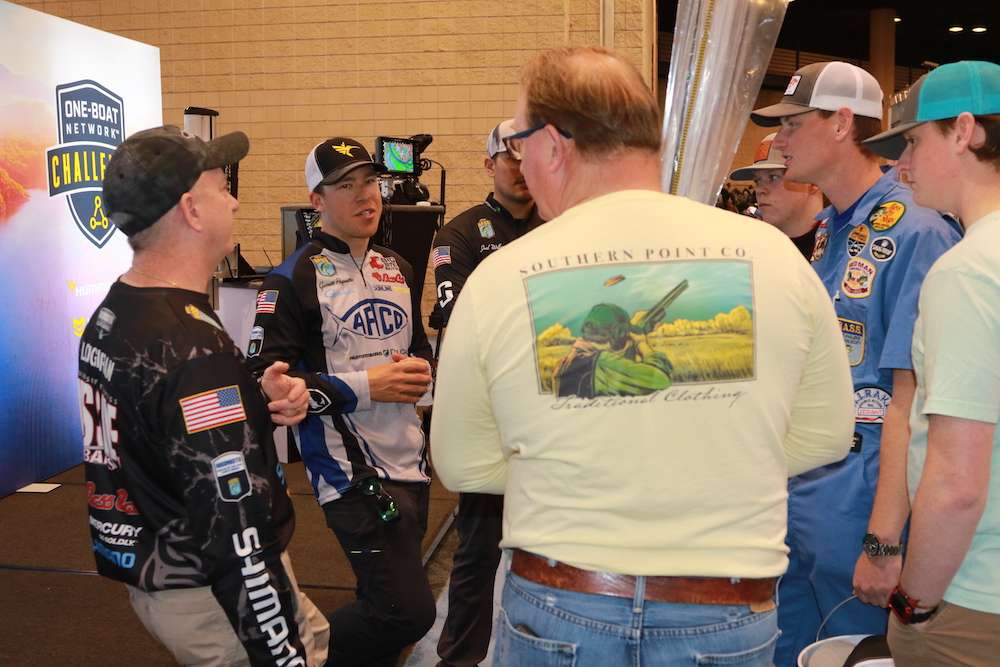 Elites Ed Loughran and Garrett Paquette talk fishing with Expo visitors. 