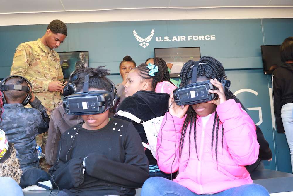 With virtual reality goggles, these kids enjoyed the sensation of sky diving.