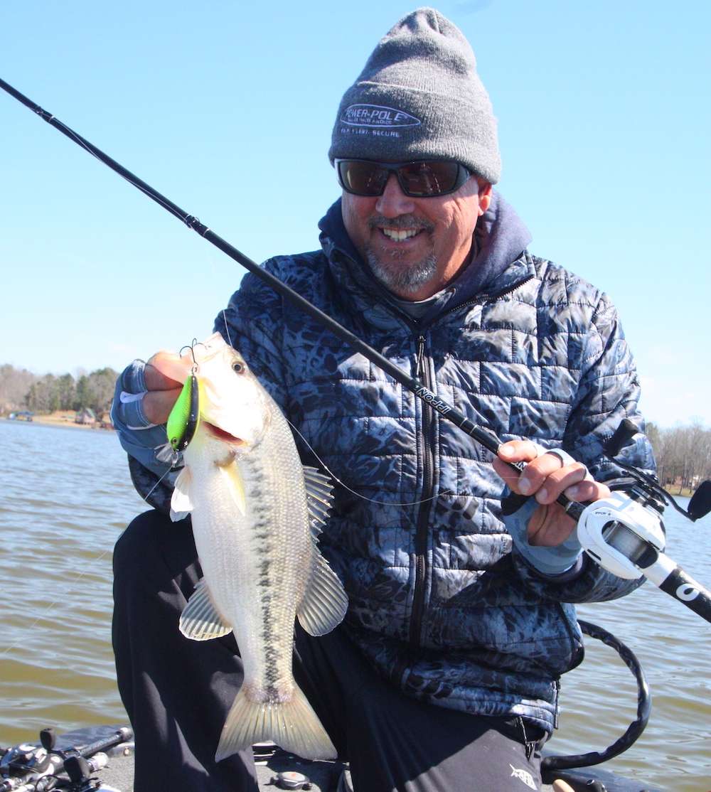 <b>11:56 a.m.</b> Tacoronte cranks up his second keeper, 2 pounds, 2 ounces, off the point on the 1.5. âI felt it tick a little piece of brush and he nailed it.â 
<p>
<b>2 HOURS LEFT</B><br>
<b>12:01 p.m.</b> Tacoronte casts the Ned rig worm to the point and catches keeper No. 3, 1 pound, 5 ounces. âTheyâre waking up! I swear I just heard a bird chirp!â <br>
<b>12:20 p.m.</b> No more love on the point, so Tacoronte runs to a shaded bank and cranks the Core Strike squarebill. âToo shallow here.â <br>
<b>12:35 p.m.</b> Tacoronte races to a sloping bank with laydowns and cranks a root beer/chartreuse Bomber 200 diver. <br>
<b>12:41 p.m.</b> He moves back to the point where he bagged three keepers and bumps the Bandit across the structure. <br>
<b>12:43 p.m.</b> Tacoronte reverts to the chartreuse 1.5 and catches his fourth keeper, 1 pound, 1 ounce. âThey canât all be the same size in this lake. Surely thereâs a big one out there somewhere!â <br>
<b>12:50 p.m.</b> Tacoronte whacks his fifth keeper, 1 pound, 6 ounces, on the 1.5. âIf this were an MLF tournament, Iâd be leading the pack!â <br>
<b>12:52 p.m.</b> Tacoronte cranks a parrot-pattern Bandit 200 around a nearby rockpile.
<p>
<b>1 HOUR LEFT</b><br>
<b>1:03 p.m.</b> Tacoronte runs to a ledge that drops quickly from 5 to 17 feet. He cranks the structure with the Bandit. <br>
<b>1:08 p.m.</b> He roots the chartreuse 1.5 around a shallow flat. âYouâd think a few fish might have moved up shallow, but youâd be wrong.â <br>
<b>1:16 p.m.</b> Tacoronte races into a small cove downlake and cranks the chartreuse 1.5 around shoreline laydowns. <br>
<b>1:35 p.m.</b> He tries the 1.5 on a steep channel bank. âScrew this; Iâm spending the rest of my time on that mud point.â <br>
<b>1:40 p.m.</b> Back on the point, Tacoronte jerks the Megabass 110 and bags his sixth keeper, Â­1-4. âI be cullinâ now!â <br>
<b>1:44 p.m.</b> Keeper No. 7, Â­2-1, succumbs to the 110 on the point. âIâm jerking it twice, then making a long pause. Theyâre hitting it on a slack line.â <br>
<b>1:45 p.m.</b> Tacoronte catches keeper No. 8, Â­1-1, on his next cast with the jerkbait.
<b>1:46 p.m.</b> A better fish whacks the jerkbait; Tacoronte goes to swing it aboard, but it comes unbuttoned. âDang it, that was a Â­3-pounder.â <br>
<b>1:50 p.m.</b> With 10 minutes remaining, Tacoronte catches keeper No. 9, 1 pound, on the jerkbait. 