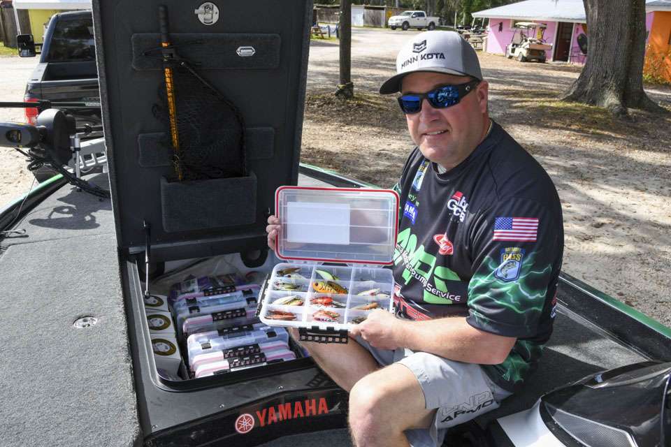 A cavernous center compartment is used to store his hard baits and even more plastics.
