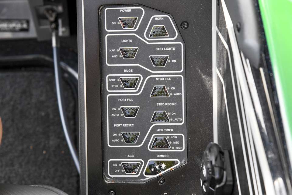 A panel at his right knee houses all of the switches he might need, like his main power, the horn, bilge pumps, nav lights and more.
