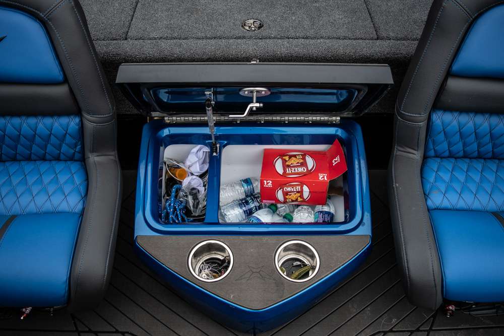 Huff uses the cooler compartment located between the driver and passenger seat to store food and drinks. The cooler is also divided, so he also keeps other essentials in the compartment separated from the food and drinks. 