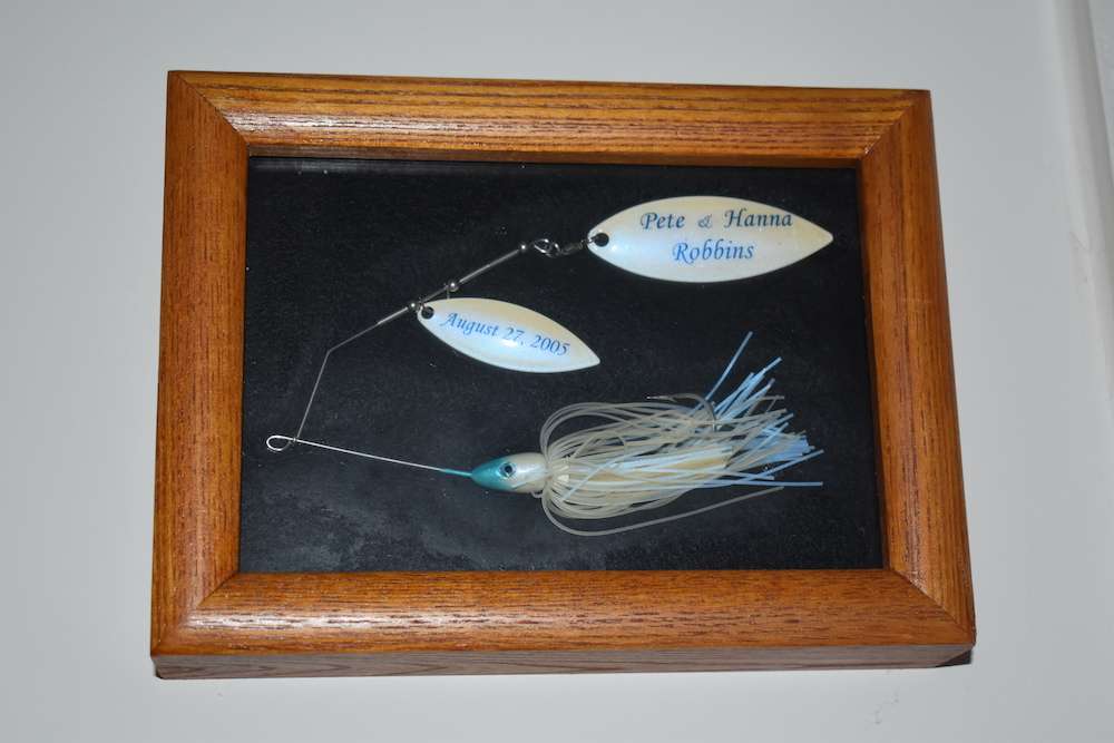 On the wall opposite the picture of his big bass, thereâs a framed spinnerbait. Pete and Hanna gave these as one of the gifts to the groomsmen at their wedding.