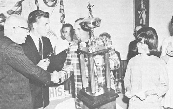 Stan Sloan was issued his trophy, with his wife, Liz, by his side.