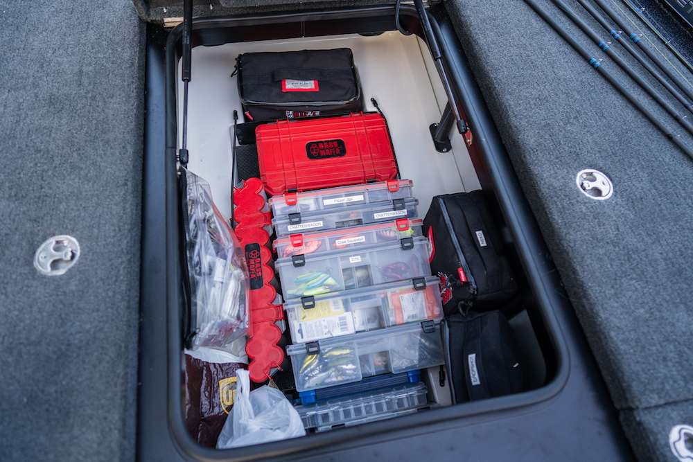This is the well-organized center storage compartment. The load is much lighter than normal as this is the gear Palaniuk is using for fun fishing around his hometown. âI broke down and got a label maker to keep it even more organized.â <p> And whatâs up with the UPS shipping pack in the lower left? Look in most any Elite Series pro's boat for the same thing. âWe get a lot of prototype products sent to us, and the contents go directly into the boat for testing.â Inside this secret package are products from Seaguar.  
