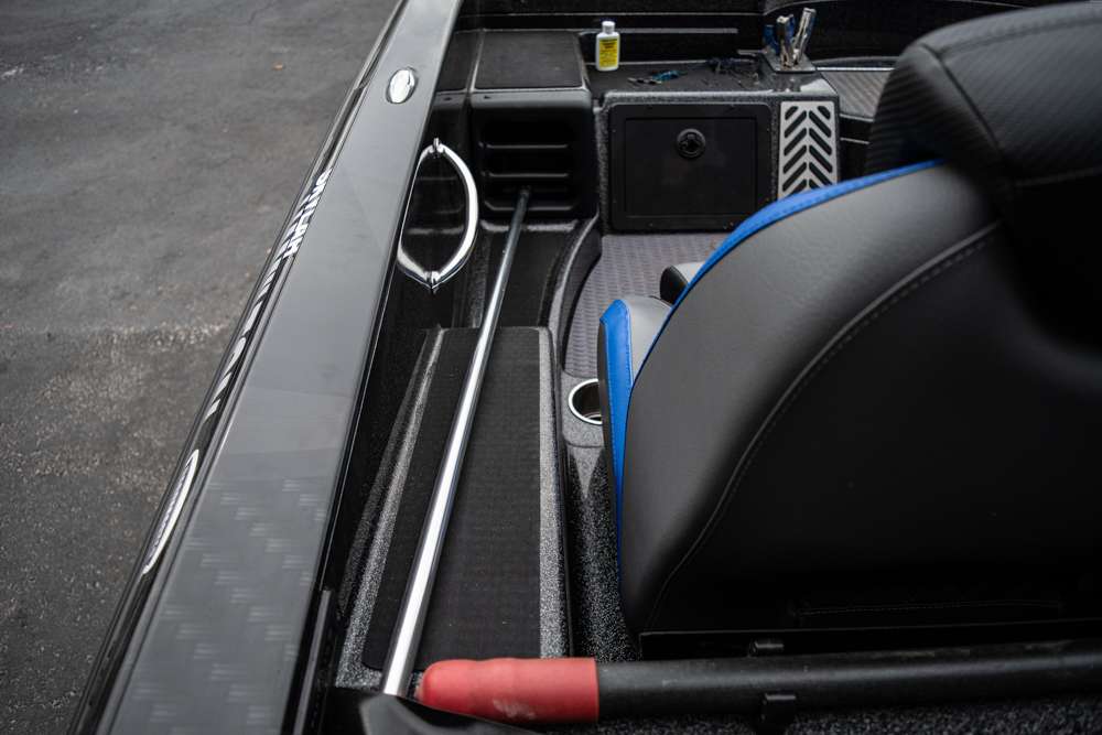 The co-angler side of the boat provides plenty of room for rods and reels, and a handle for holding onto while riding. 