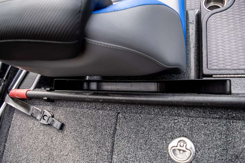 Behind the passenger seat is a net holder. This placement is convenient because it offers quick accessibility, and the net does not take up space in a rod locker. 
