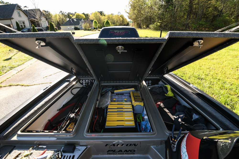 The Falcon includes three front lockers, each opening vertically. âThis is nice because it allows you to access the side lockers easily from both inside and outside the boat without the door being in the way. It also keeps you from dumping rods in the water when opening the doors.â Both side lockers are rod lockers which include rod tubes. The left rod locker is used for rods, while the right rod locker acts as his âjunk drawer.â