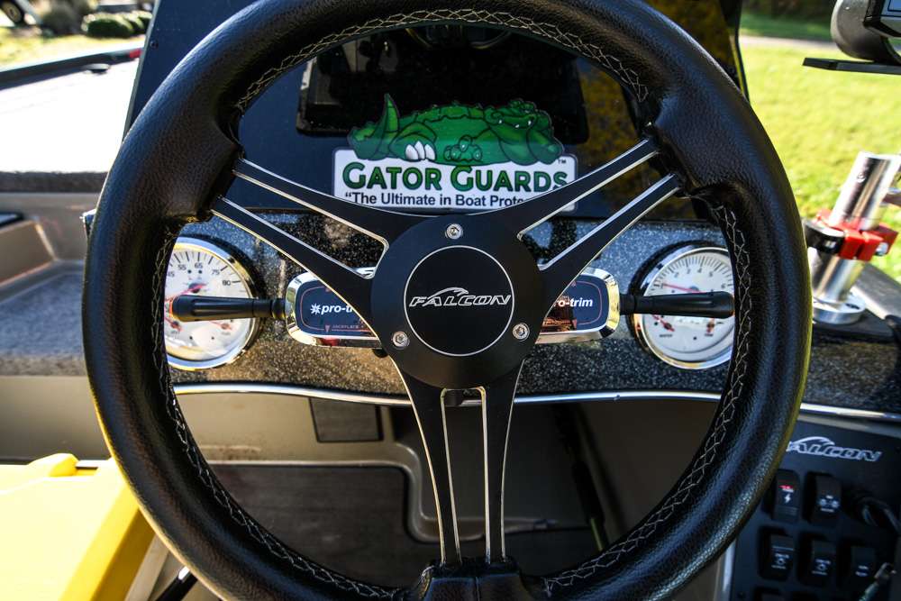 Two gauges, two blinker style trim tabs and a leather steering wheel â simple and easy without being cluttered. 