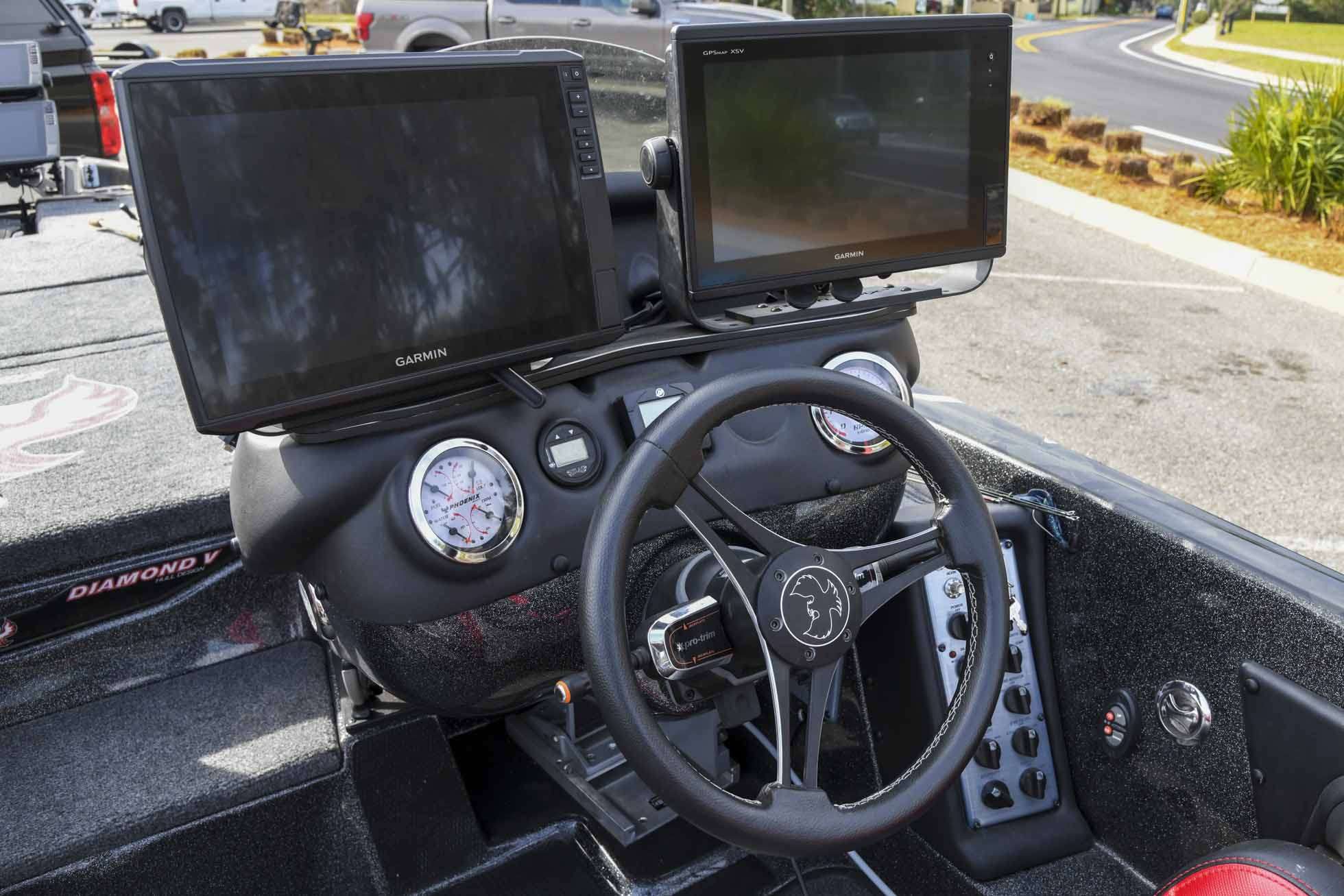  His console is flanked by two 12-inch Garmin Echomap Ultras. âI run one that is nothing but mapping, and I run one that is nothing but sonar,â Mullins explained. 