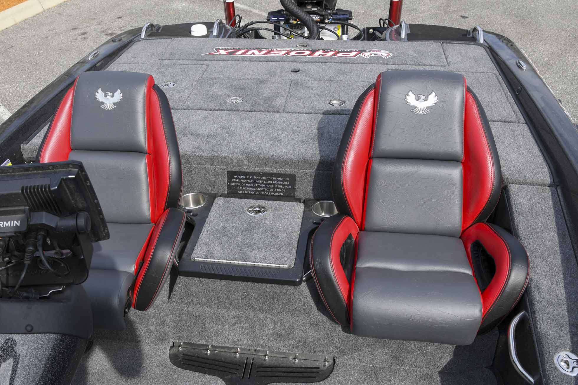 Comfortable seats make long runs more manageable, while also allowing for extra storage. The back deck also is spacious, concealing his livewells, extra storage compartments and his bilge area.
