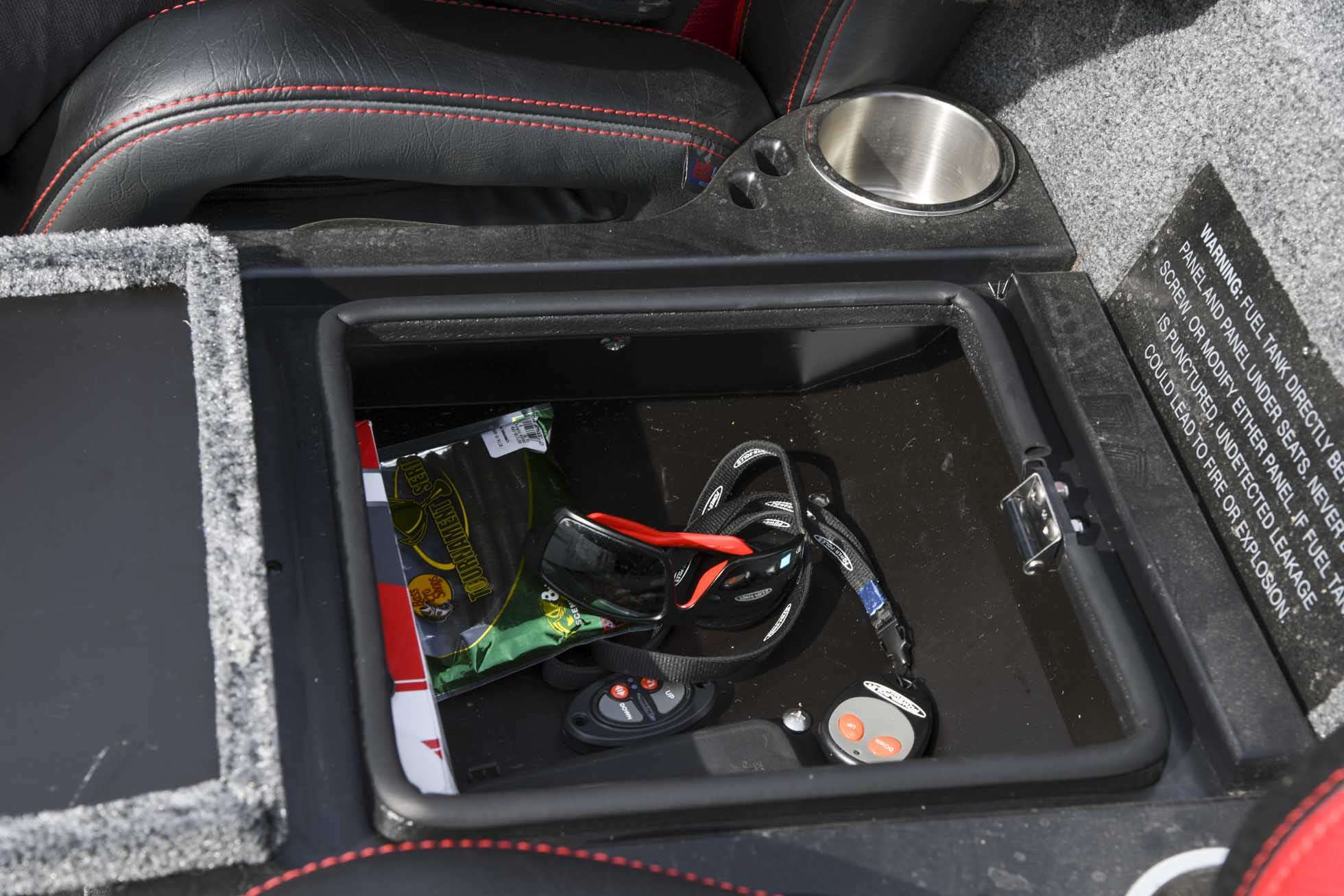 Between the seats is a well-designed storage compartment in which Mullins puts his keys, cellphone and other miscellany. âItâs just a great box,â Mullins said. âMy other boat didnât have anything like that.â
