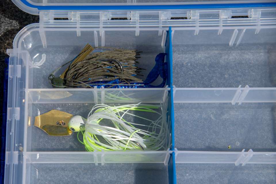Cappo places the Thunder Cricket Vibrating Swim Jig in the second slot of the box.